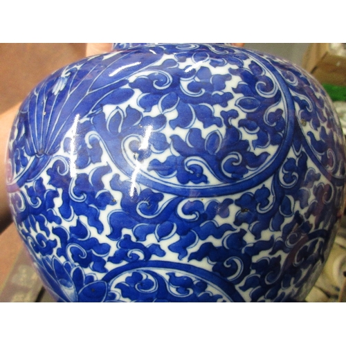 586 - Large Chinese porcelain bottle vase, all-over floral decorated in blue and white