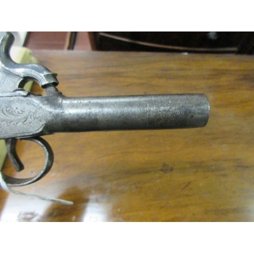 288 - Small 18th / 19th Century percussion pistol with engraved decoration and touch marks to the barrel w... 