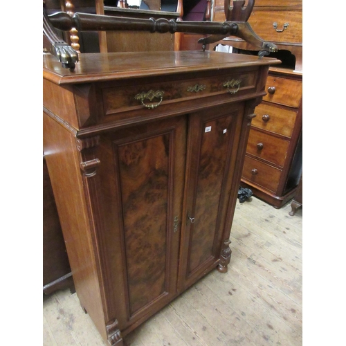 1849 - 19th Century Swiss walnut side cabinet with a single drawer above two panel doors, raised on bun fee... 