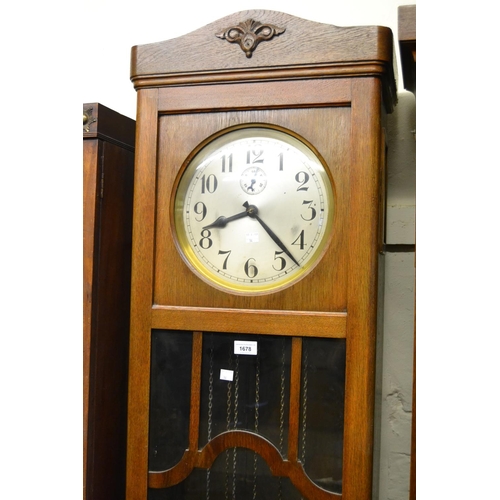 1678 - Early to mid 20th Century Continental oak longcase clock, the silvered dial with Arabic numerals and... 