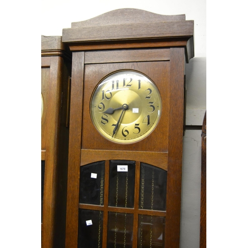 1679 - Early to mid 20th Century Continental oak longcase clock, the brass dial with Arabic numerals and th... 