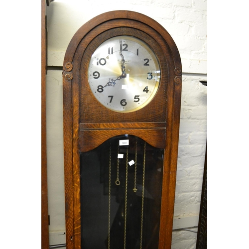 1680 - Early to mid 20th Century oak longcase clock, the silvered dial with Arabic numerals, signed Braving... 