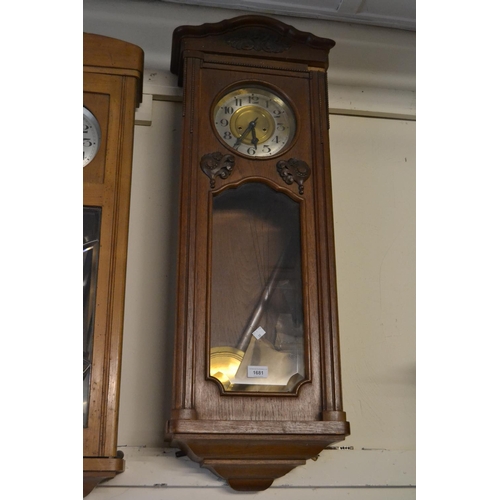 1681 - Early 20th Century oak Vienna type wall clock the gilt and silvered dial with Arabic numerals, the c... 