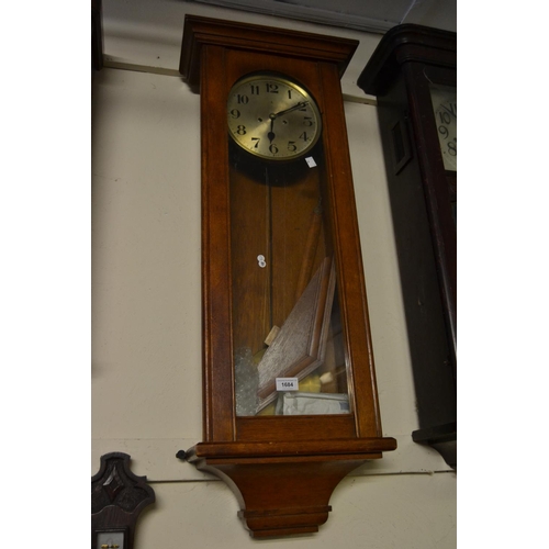 1684 - Early 20th Century oak Vienna type two train wall clock, the silvered dial with Arabic numerals and ... 