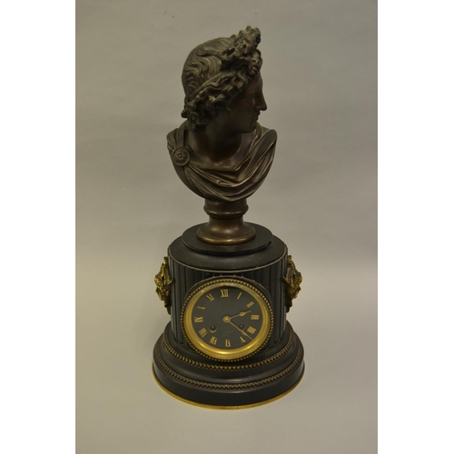 1700 - 19th Century French black slate dark patinated and gilt bronze mounted mantel clock, the cylindrical... 