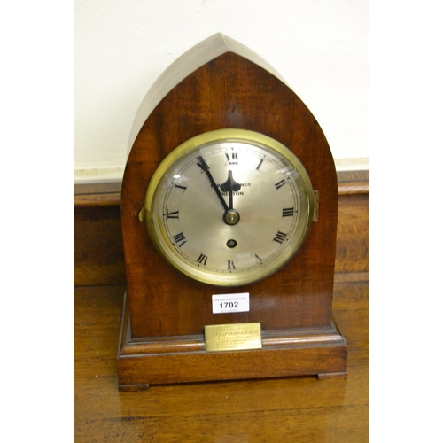 1702 - Early 20th Century mahogany lancet shaped mantel clock, the silvered dial with Roman numerals, signe... 