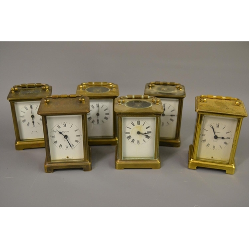 1704 - Six various 20th Century brass cased carriage clocks , four with visible escapements and enamel dial... 