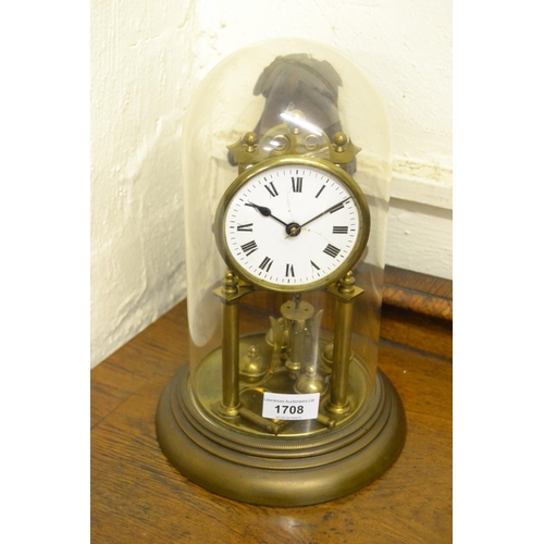 1708 - Brass 300 day anniversary clock and a perspex dome