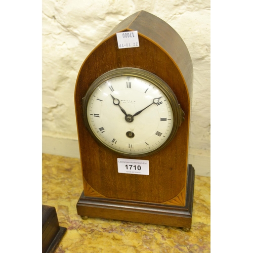 1710 - Edwardian mahogany and boxwood line inlaid lancet shaped mantel clock with an enamel dial, Roman num... 