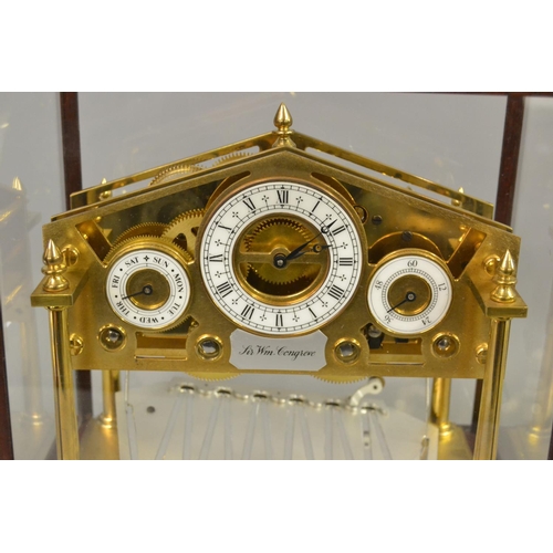 1720 - Devon Clocks England, a small reproduction brass Congreve clock Limited Edition No. 151 of 500 in a ... 