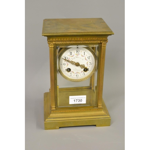 1730 - Late 19th or early 20th Century French gilt brass library clock, the four glass case with an urn sur... 