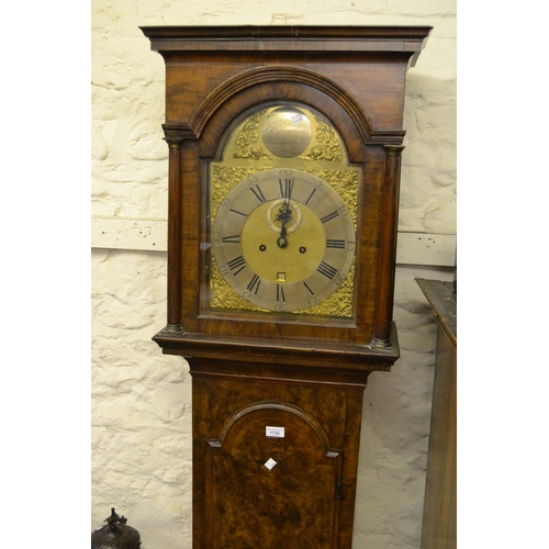 1732 - 18th Century walnut longcase clock, the moulded broken arch hood with flanking pilasters above an ar... 