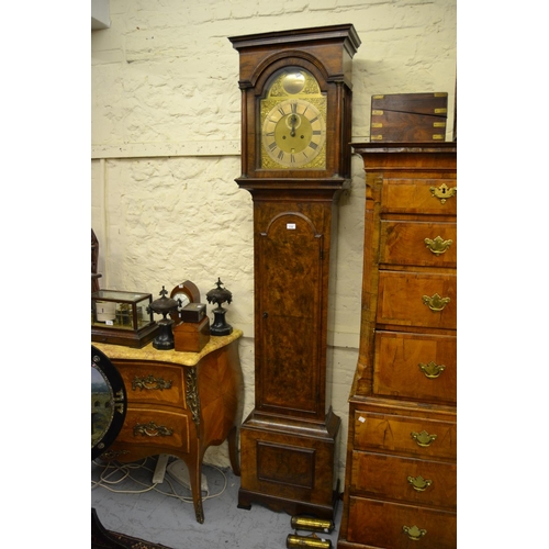 1732 - 18th Century walnut longcase clock, the moulded broken arch hood with flanking pilasters above an ar... 