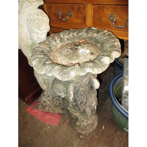 2294 - Small weathered cast concrete garden bird bath with figural base