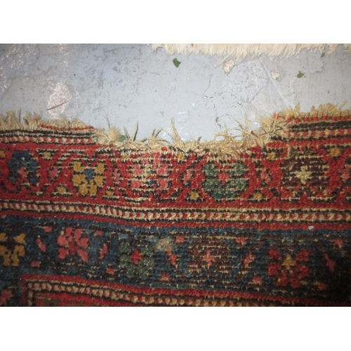 5 - Kurdish rug of all-over floral design with multiple borders on a wine ground, approximately 6ft x 4f... 