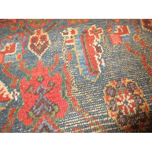 5 - Kurdish rug of all-over floral design with multiple borders on a wine ground, approximately 6ft x 4f... 