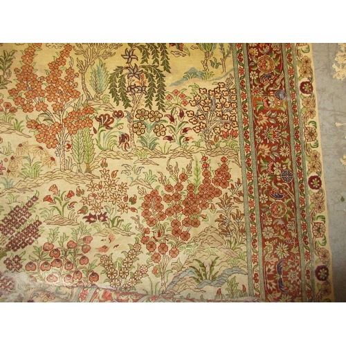 18 - Turkish silk rug decorated with birds in a landscape, approximately 60ins x 36ins