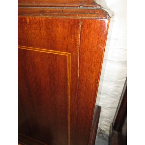 1701 - Early 19th Century mahogany longcase clock, the broken arch hood with flanking spiral pilasters, sha... 