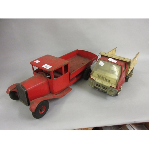 198 - Early 20th to mid 20th Century Triang red painted toy open back truck and a Tonka tipper truck (at f... 