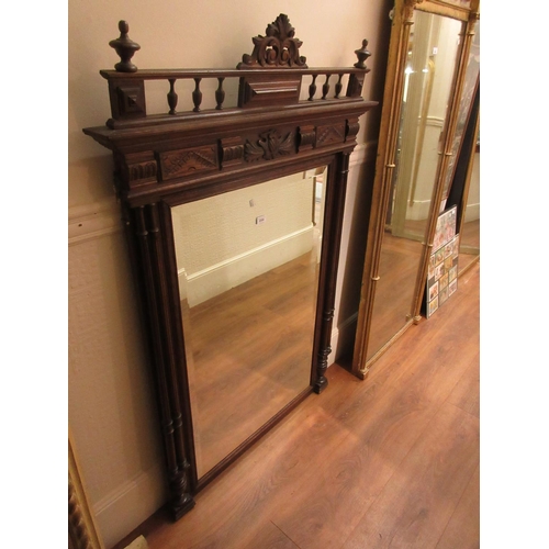 2334 - 19th Century French oak overmantel mirror with a shaped surmount above a rectangular plate, flanked ... 