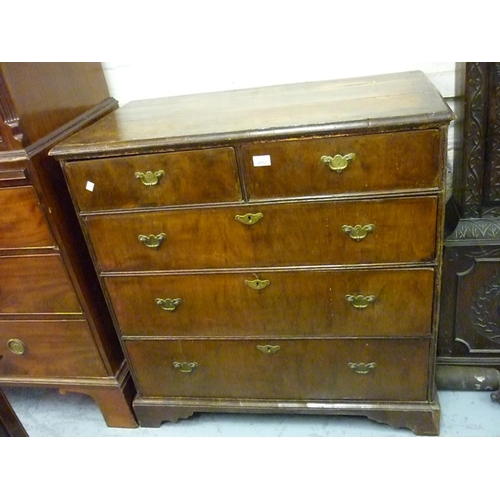 2357 - Early 18th Century walnut chest, the crossbanded and moulded top above two short and three long draw... 