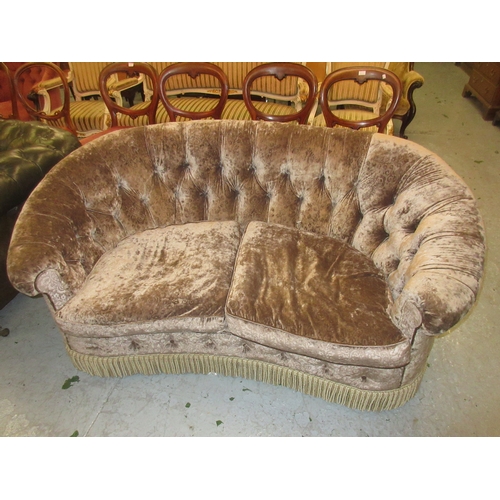 2365 - Newly upholstered kidney shaped two seat sofa with a buttoned grey velvet type upholstery