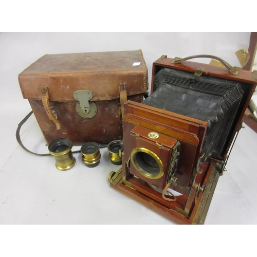 392 - Thornton Pickard Imperial Perfecta mahogany and gilt brass plate camera with three various lenses an... 