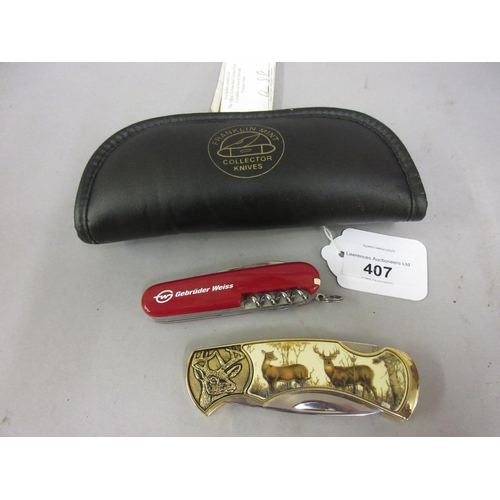 407 - Franklin mint ' Buck ' collector's knife in case, together with a Swiss army knife