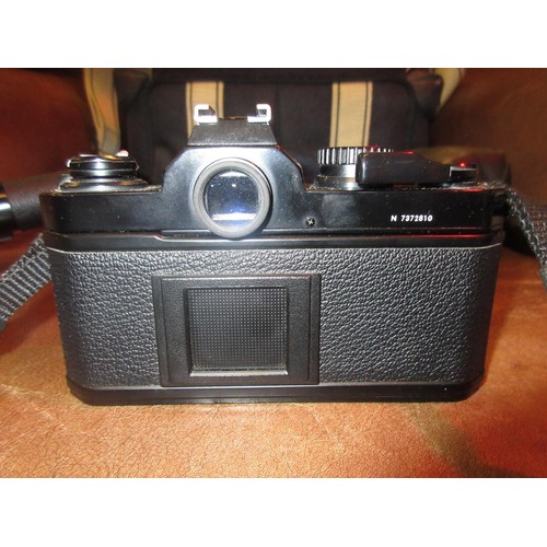 408 - Nikon FM2N 35mm camera outfit with motor drive and three lenses, 35mm F2, 85mm F2 and 24mm 2.8 wide ... 