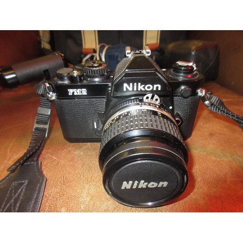 408 - Nikon FM2N 35mm camera outfit with motor drive and three lenses, 35mm F2, 85mm F2 and 24mm 2.8 wide ... 