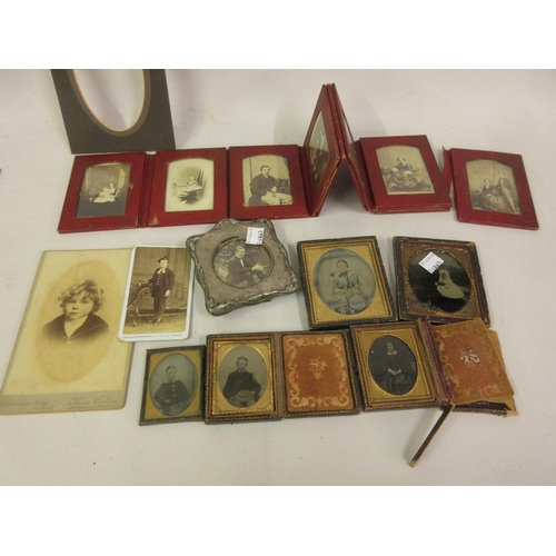 173 - Collection of mainly Victorian Ambrotypes and photographs including a family group in a folding red ... 