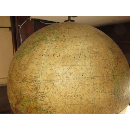 213 - Philips' 19in terrestrial globe, the aluminium body with paper covering and brass suspension system