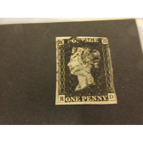 229 - Penny Black postal stamp with three margins housed in a small pocket album