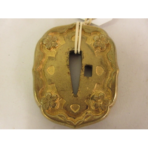 235 - 19th Century Japanese gilded tsuba, cast with flowers and signature to the reverse, 2.5ins x 2ins