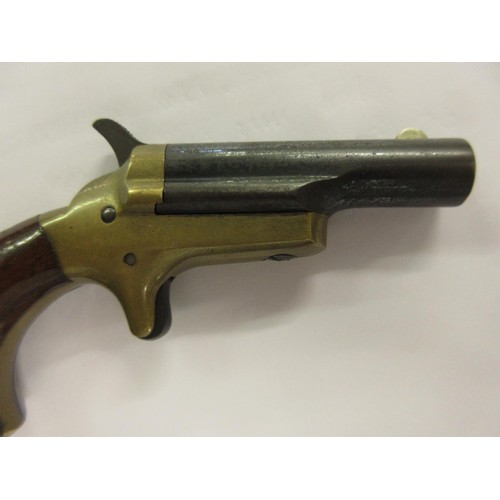 172 - Late 19th or early 20th Century Colt 41 calibre rim fire Derringer pistol with a steel barrel, brass... 