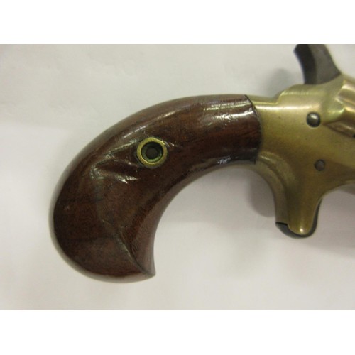 172 - Late 19th or early 20th Century Colt 41 calibre rim fire Derringer pistol with a steel barrel, brass... 