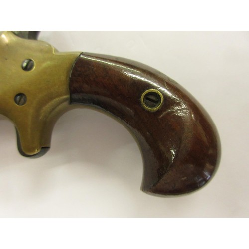 172 - Late 19th or early 20th Century Colt 41 calibre rim fire Derringer pistol with a steel barrel, brass... 