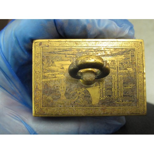 209 - Japanese gilt metal miniature four drawer table cabinet, together with a group of five small bronze ... 