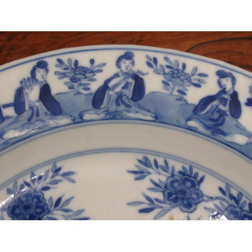 415 - Chinese Kangxi blue and white circular dish painted with figures in a garden, six character mark wit... 