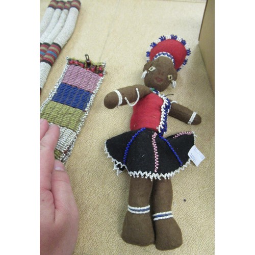 295 - Quantity of native Indian bead work items including: collar, fly whips and a doll