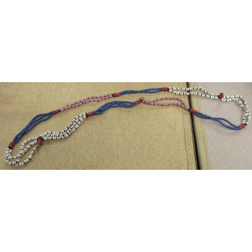 295 - Quantity of native Indian bead work items including: collar, fly whips and a doll