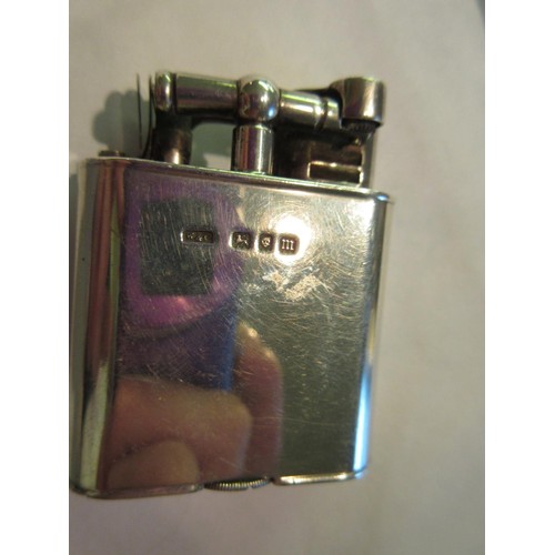 854 - Dunhill ' Unique ' London silver mounted sports lighter (no case), 2.25ins high