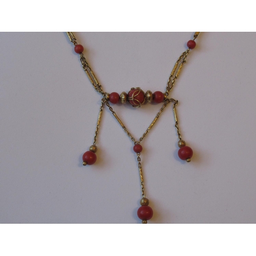 1032 - Victorian gold and coral necklet with three coral drops