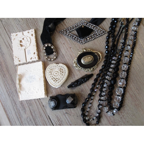 1040 - Small quantity of French jet, marcasite and other costume jewellery