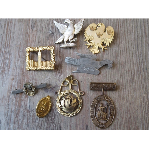 1045 - Various gold plated and other badges