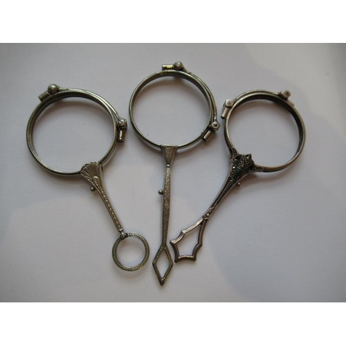 1046 - Three various white metal lorgnette frames (no glass)