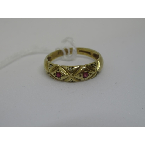 1057 - 9ct Gold ruby and diamond gypsy set ring