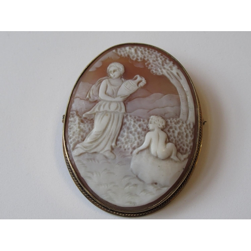 1070 - 9ct Gold mounted cameo brooch depicting a classical female and child in a landscape, 2.25ins x 1.5in... 