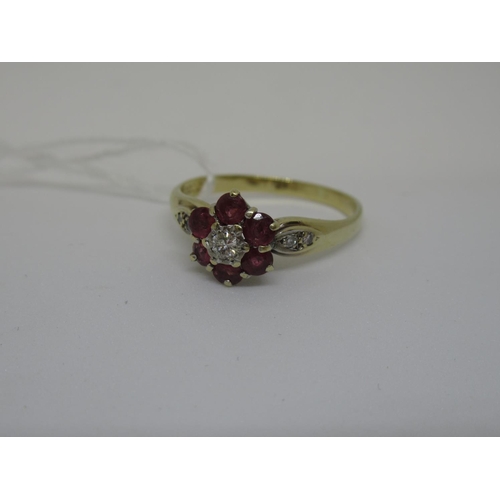 1071 - 9ct Gold diamond and pink ruby cluster ring