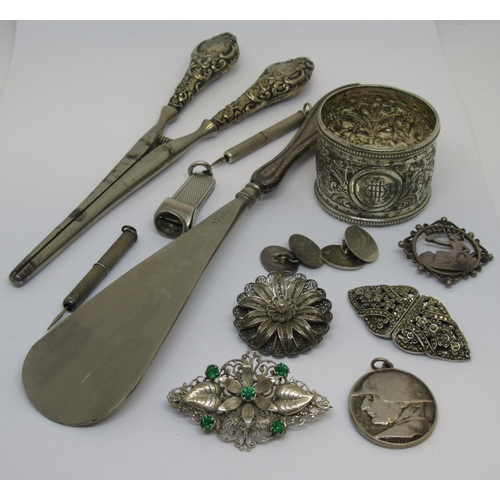 1096 - Small quantity of silver jewellery, silver napkin ring, two silver cased cigar piercers, silver case... 